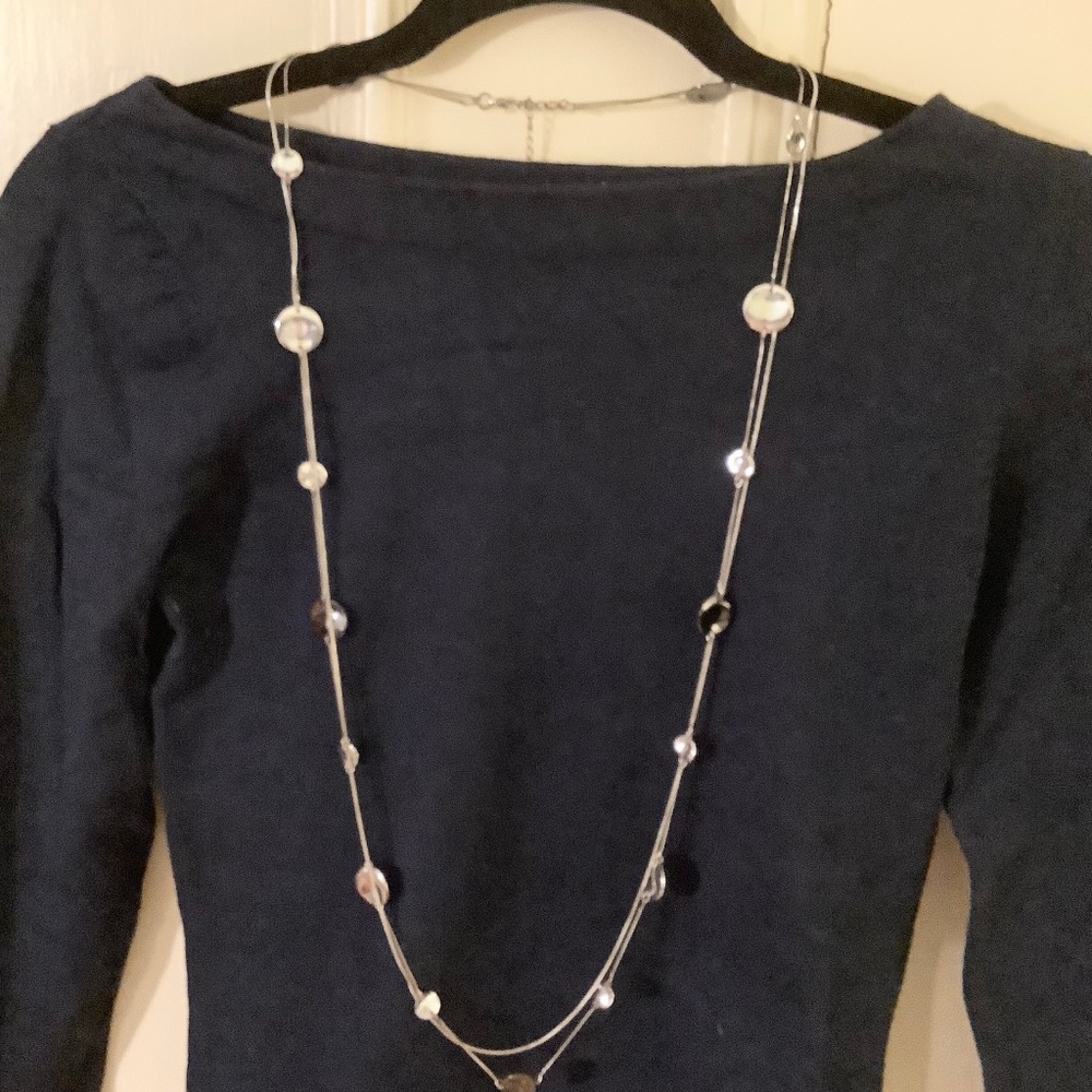 🌸 FREE with Purchase 
Double Strand Silver Necklace with Disks